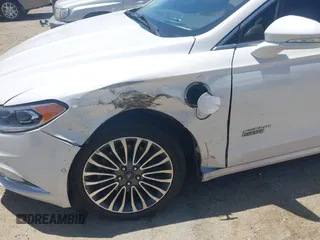 2017 Ford Fusion Titanium z VIN 3FA6P0SU0HR329224, wystawiony jako IAAI lot #42291605 z przebiegiem 176 728 mil mil oraz . Historia ofert i sprzedaży dostępna na DreamBid. Obrazek 6.