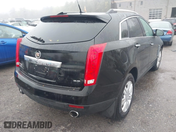 2014 Cadillac SRX Luxury Collection z VIN 3GYFNEE32ES643679, wystawiony jako IAAI lot #42172274 z przebiegiem 122 276 mil mil oraz . Historia ofert i sprzedaży dostępna na DreamBid. Obrazek 4.