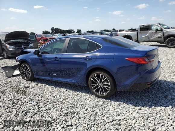 2025 Toyota Camry LE with VIN 4T1DAACK0SU075581, listed as a Copart auction lot 54570525 with 2,329 mi miles and Non Repairable. Bid and sale history available at DreamBid. Image 2.
