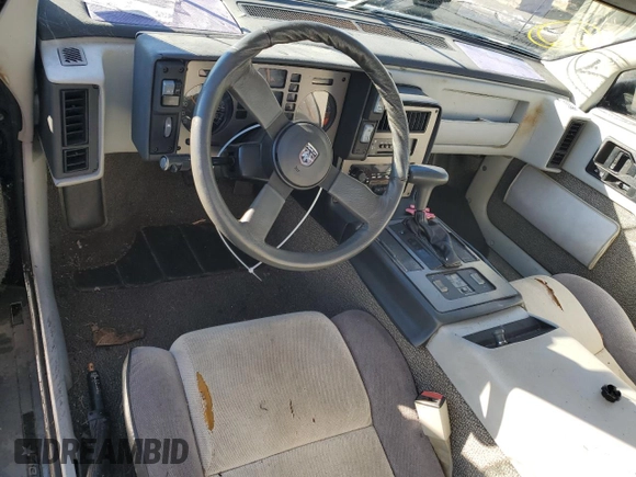 1985 Pontiac Fiero z VIN 1G2PG3796FP269589, wystawiony jako Copart lot #73338954 z przebiegiem 34 364 mil mil oraz Czysty tytuł • Clean title. Historia ofert i sprzedaży dostępna na DreamBid. Obrazek 8.