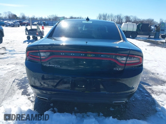 2015 Dodge Charger SXT with VIN 2C3CDXHG5FH841090, listed as a IAAI auction lot 41293591 with 107,732 mi miles and . Bid and sale history available at DreamBid. Image 16.