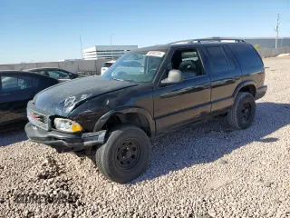 1997 GMC Jimmy SLS with VIN 1GKDT13W8V2560329, listed as a Copart auction lot 80992204 with 231,051 mi miles and Salvage Title. Bid and sale history available at carsss.com. Image 1.
