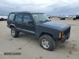 1998 Jeep Cherokee Sport with VIN 1J4FJ68S6WL188802, listed as a Copart auction lot 52094005 with 199,586 mi miles and Salvage Title. Bid and sale history available at carsss.com. Image 4.
