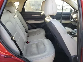 2018 Mazda CX-5 Grand Touring z VIN JM3KFBDMXJ0390680, wystawiony jako Copart lot #51654345 z przebiegiem 67 167 mil mil oraz Szkoda całkowita • Salvage title. Historia ofert i sprzedaży dostępna na DreamBid. Obrazek 11.