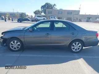 2005 Toyota Camry LE with VIN 4T1BF30K55U619313, listed as a IAAI auction lot 41854001 with 89,982 mi miles and . Bid and sale history available at DreamBid. Image 15.
