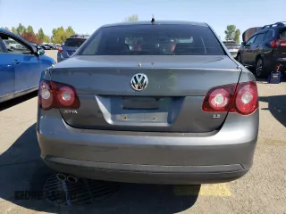 2010 Volkswagen Jetta SE z VIN 3VWRX7AJ4AM129714, wystawiony jako Copart lot #52975835 z przebiegiem 166 554 mil mil oraz Szkoda całkowita • Salvage title. Historia ofert i sprzedaży dostępna na DreamBid. Obrazek 6.