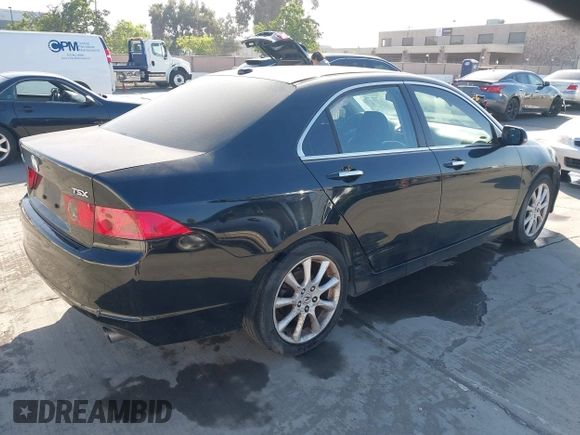 2006 Acura TSX Navi with VIN JH4CL969X6C014461, listed as a IAAI auction lot 42206844 with 119,201 mi miles and . Bid and sale history available at DreamBid. Image 4.