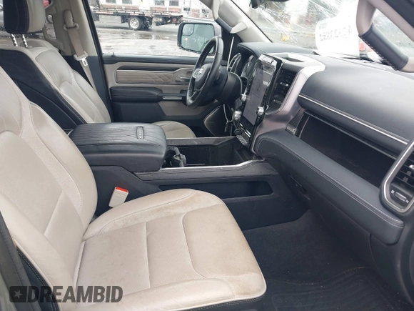 2023 Ram 1500 Limited with VIN 1C6SRFHT1PN531759, listed as a IAAI auction lot 42323882 with 47,809 mi miles and . Bid and sale history available at DreamBid. Image 5.