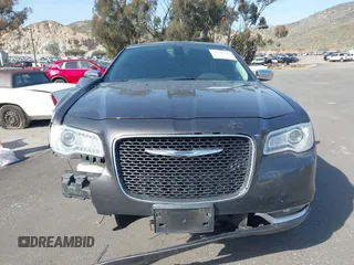 2016 Chrysler 300 with VIN 2C3CCAEG3GH324716, listed as a IAAI auction lot 41776116 with 134,978 mi miles. Bid and sale history available at carsss.com. Image 13.