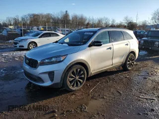 2019 Kia Sorento S V6 with VIN 5XYPGDA56KG591900, listed as a Copart auction lot 86594944 with 99,556 mi miles and Salvage Title. Bid and sale history available at carsss.com. Image 1.