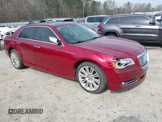 2014 Chrysler 300 with VIN 2C3CCAEG3EH355185, listed as a IAAI auction lot 41765179 with 243,059 mi miles. Bid and sale history available at carsss.com. Image 1.