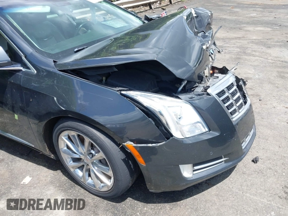 2013 Cadillac XTS Luxury z VIN 2G61P5S34D9109189, wystawiony jako IAAI lot #42242533 z przebiegiem 178 234 mil mil oraz . Historia ofert i sprzedaży dostępna na DreamBid. Obrazek 18.