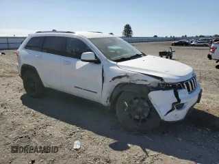 2017 Jeep Grand Cherokee Laredo z VIN 1C4RJFAG6HC618162, wystawiony jako Copart lot #56150195 z przebiegiem 133 766 mil mil oraz Szkoda całkowita • Salvage title. Historia ofert i sprzedaży dostępna na DreamBid. Obrazek 4.
