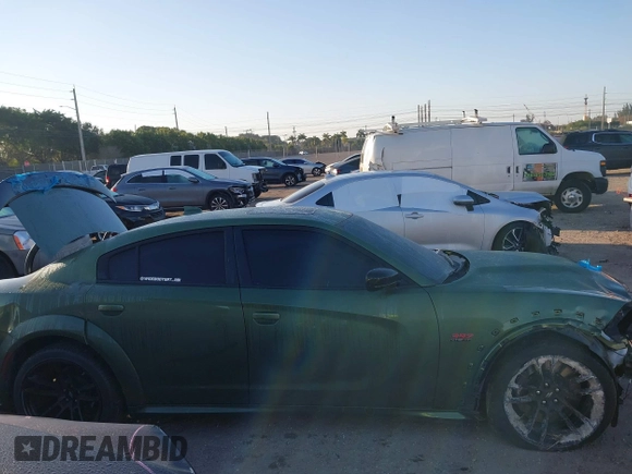 2023 Dodge Charger Scat Pack Widebody with VIN 2C3CDXGJXPH655916, listed as a IAAI auction lot 41439932 with 16,128 mi miles and . Bid and sale history available at carsss.com. Image 14.