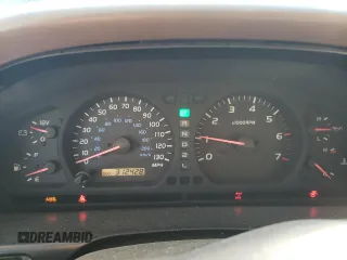 1999 Toyota Land Cruiser with VIN JT3HT05J5X0072564, listed as a Copart auction lot 77000044 with 312,428 mi miles and Salvage Title. Bid and sale history available at carsss.com. Image 9.