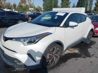2018 Toyota C-HR XLE z VIN JTNKHMBX5J1007391, wystawiony jako IAAI lot #42432809 z przebiegiem 139 356 mil mil oraz . Historia ofert i sprzedaży dostępna na DreamBid. Obrazek 6.