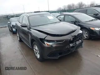 2019 Alfa Romeo Stelvio z VIN ZASPAKAN1K7C42038, wystawiony jako IAAI lot #41424661 z przebiegiem 86 713 mil mil oraz . Historia ofert i sprzedaży dostępna na DreamBid. Obrazek 1.