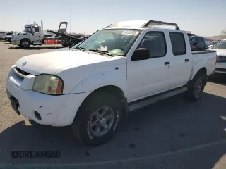 2004 Nissan Frontier XE z VIN 1N6ED27T44C450726, wystawiony jako Copart lot #57004045 z przebiegiem 151 638 mil mil oraz Szkoda całkowita • Salvage title. Historia ofert i sprzedaży dostępna na DreamBid. Obrazek 1.