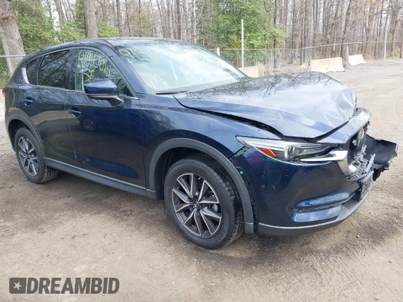2018 Mazda CX-5 Grand Touring with VIN JM3KFBDM3J0377866, listed as a IAAI auction lot 41947014 with 70,446 mi miles. Bid and sale history available at carsss.com. Image 1.