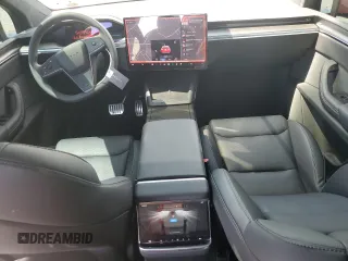2023 Tesla Model X Plaid with VIN 7SAXCBE66PF427020, listed as a Copart auction lot 53890405 with 30,575 mi miles and Salvage Title. Bid and sale history available at DreamBid. Image 8.