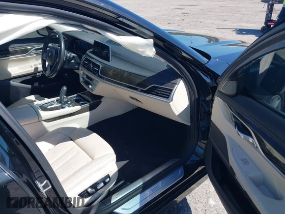 2018 BMW 7 Series 750i with VIN WBA7F0C54JGM22900, listed as a IAAI auction lot 41673673 with 66,264 mi miles. Bid and sale history available at carsss.com. Image 5.