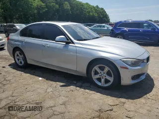 2015 BMW 3 Series 328i with VIN WBA3A5G51FNS88757, listed as a Copart auction lot 57448475 with 183,586 mi miles and Clean title. Bid and sale history available at DreamBid. Image 4.