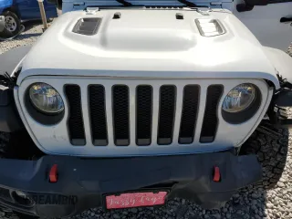 2022 Jeep Wrangler Unlimited Rubicon z VIN 1C4HJXFN2NW212592, wystawiony jako Copart lot #53071895 z przebiegiem 49 986 mil mil oraz Szkoda całkowita • Salvage title. Historia ofert i sprzedaży dostępna na DreamBid. Obrazek 12.