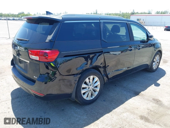 2016 Kia Sedona SX with VIN KNDMC5C15G6143818, listed as a IAAI auction lot 42051284 with 97,666 mi miles and . Bid and sale history available at carsss.com. Image 4.