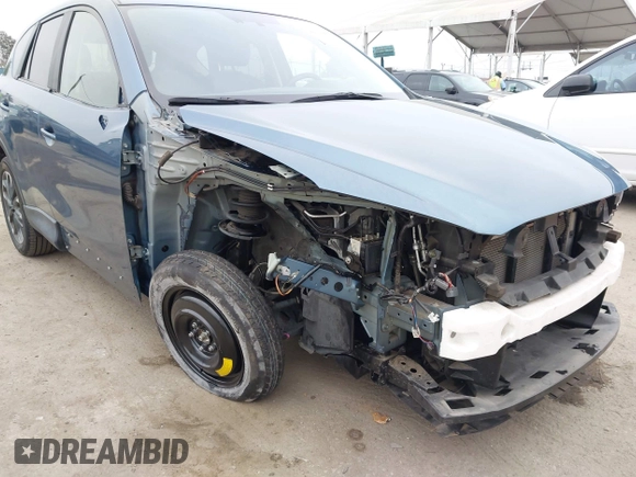2016 Mazda CX-5 Grand Touring with VIN JM3KE2DY7G0875678, listed as a IAAI auction lot 42104888 with 30,566 mi miles. Bid and sale history available at carsss.com. Image 6.