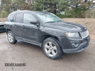2014 Jeep Compass Latitude with VIN 1C4NJDEB2ED698213, listed as a IAAI auction lot 41997204 with 97,893 mi miles. Bid and sale history available at carsss.com. Image 1.