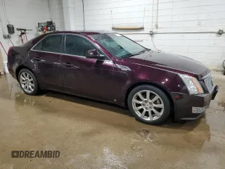 2009 Cadillac CTS AWD z VIN 1G6DT57V990136974, wystawiony jako Copart lot #50154525 z przebiegiem 196 934 mil mil oraz Szkody całkowita. Historia ofert i sprzedaży dostępna na DreamBid. Obrazek 4.