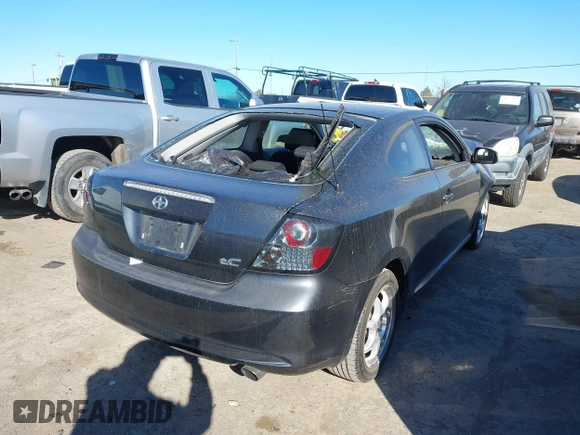 2005 Scion tC with VIN JTKDE177550061291, listed as a IAAI auction lot 41698721 with 129,266 mi miles. Bid and sale history available at carsss.com. Image 4.