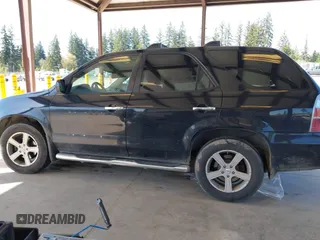 2006 Acura MDX Touring RES w/Navi with VIN 2HNYD18996H520308, listed as a IAAI auction lot 42040007 with 220,146 mi miles. Bid and sale history available at carsss.com. Image 14.