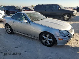2004 Mercedes-Benz SLK-Class with VIN WDBKK65FX4F300214, listed as a Copart auction lot 82160974 with 75,964 mi miles and Salvage Title. Bid and sale history available at carsss.com. Image 4.