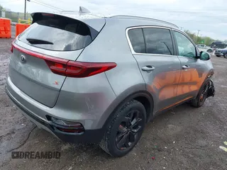 2020 Kia Sportage S with VIN KNDP6CAC9L7703731, listed as a IAAI auction lot 41951027 with 76,771 mi miles. Bid and sale history available at carsss.com. Image 4.