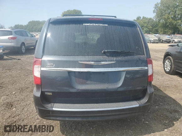 2013 Chrysler Town & Country Touring with VIN 2C4RC1BG4DR821029, listed as a Copart auction lot 70609704 with 139,610 mi miles and Salvage Title. Bid and sale history available at carsss.com. Image 6.