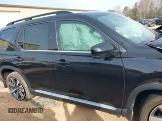 2023 Honda Pilot Elite z VIN 5FNYG1H82PB045029, wystawiony jako IAAI lot #41779289 z przebiegiem 27 484 mil mil oraz . Historia ofert i sprzedaży dostępna na DreamBid. Obrazek 13.