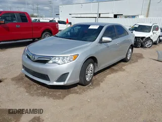 2014 Toyota Camry L with VIN 4T4BF1FK0ER384563, listed as a IAAI auction lot 41782381 with 75,868 mi miles. Bid and sale history available at carsss.com. Image 2.