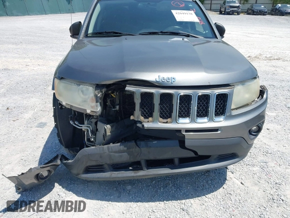 2012 Jeep Compass Sport with VIN 1C4NJCBB9CD610317, listed as a IAAI auction lot 42049138 with 127,616 mi miles and . Bid and sale history available at carsss.com. Image 6.