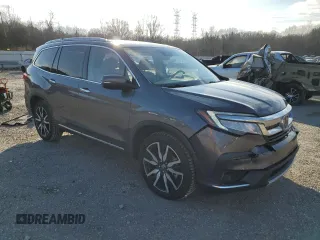 2020 Honda Pilot Touring 8-Passenger with VIN 5FNYF5H92LB024047, listed as a Copart auction lot 41630695 with 74,067 mi miles and Salvage Title. Bid and sale history available at DreamBid. Image 4.