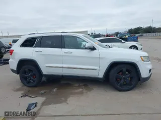 2013 Jeep Grand Cherokee Limited with VIN 1C4RJFBT3DC545662, listed as a IAAI auction lot 41576431 with 153,142 mi miles. Bid and sale history available at carsss.com. Image 13.