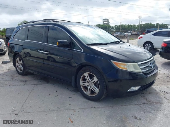 2013 Honda Odyssey Touring with VIN 5FNRL5H92DB003200, listed as a IAAI auction lot 41920237 with 167,483 mi miles. Bid and sale history available at carsss.com. Image 1.