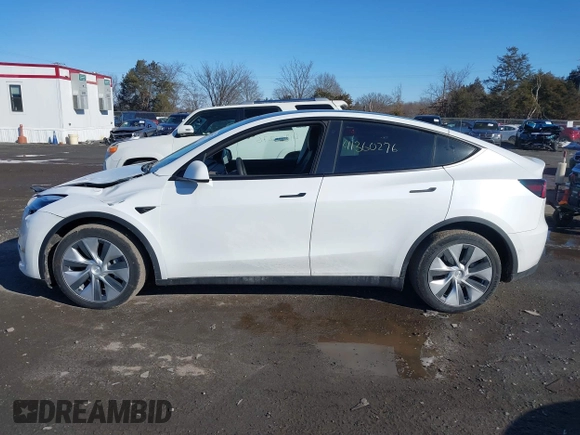 2022 Tesla Model Y Long Range with VIN 7SAYGDEE2NF440548, listed as a IAAI auction lot 41360276 with 19,714 mi miles and . Bid and sale history available at carsss.com. Image 14.