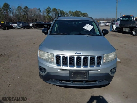 2012 Jeep Compass Latitude with VIN 1C4NJDEB4CD676310, listed as a IAAI auction lot 41714804 with 162,086 mi miles. Bid and sale history available at carsss.com. Image 6.