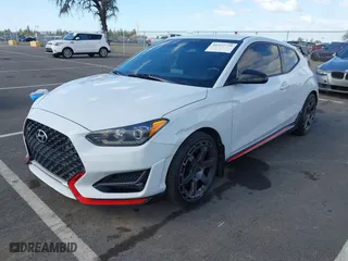2019 Hyundai Veloster N with VIN KMHT36AH6KU001916, listed as a IAAI auction lot 41577775 with 77,471 mi miles. Bid and sale history available at carsss.com. Image 2.