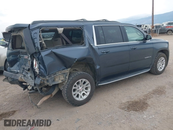 2019 GMC Yukon XL SLT with VIN 1GKS2GKC0KR345860, listed as a IAAI auction lot 40727072 with 127,568 mi miles and . Bid and sale history available at carsss.com. Image 4.
