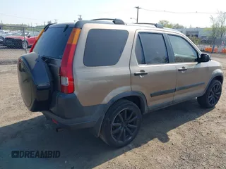 2003 Honda CR-V EX with VIN SHSRD78853U147671, listed as a IAAI auction lot 42117265 with 228,072 mi miles and . Bid and sale history available at carsss.com. Image 4.