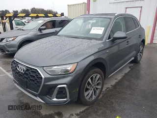 2023 Audi Q5 S line Premium Plus z VIN WA1EAAFY7P2178566, wystawiony jako IAAI lot #41734994 z przebiegiem Nie podano mil oraz . Historia ofert i sprzedaży dostępna na DreamBid. Obrazek 17.