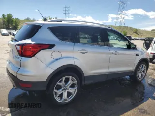2019 Ford Escape Titanium с VIN 1FMCU9J90KUB85595, выставлен на аукционе Copart как лот 57410045 с пробегом 47 995 миль миль и Списание • Salvage title. История ставок и продаж доступна на DreamBid. Изображение 3.