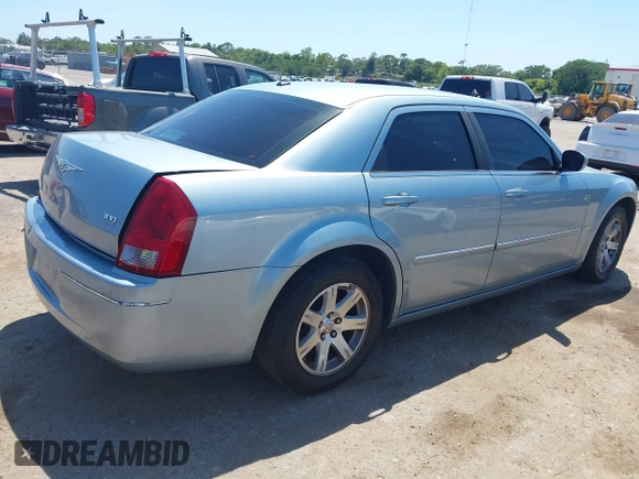 2006 Chrysler 300 Touring with VIN 2C3KA53G56H324954, listed as a IAAI auction lot 42058478 with 124,933 mi miles. Bid and sale history available at carsss.com. Image 4.
